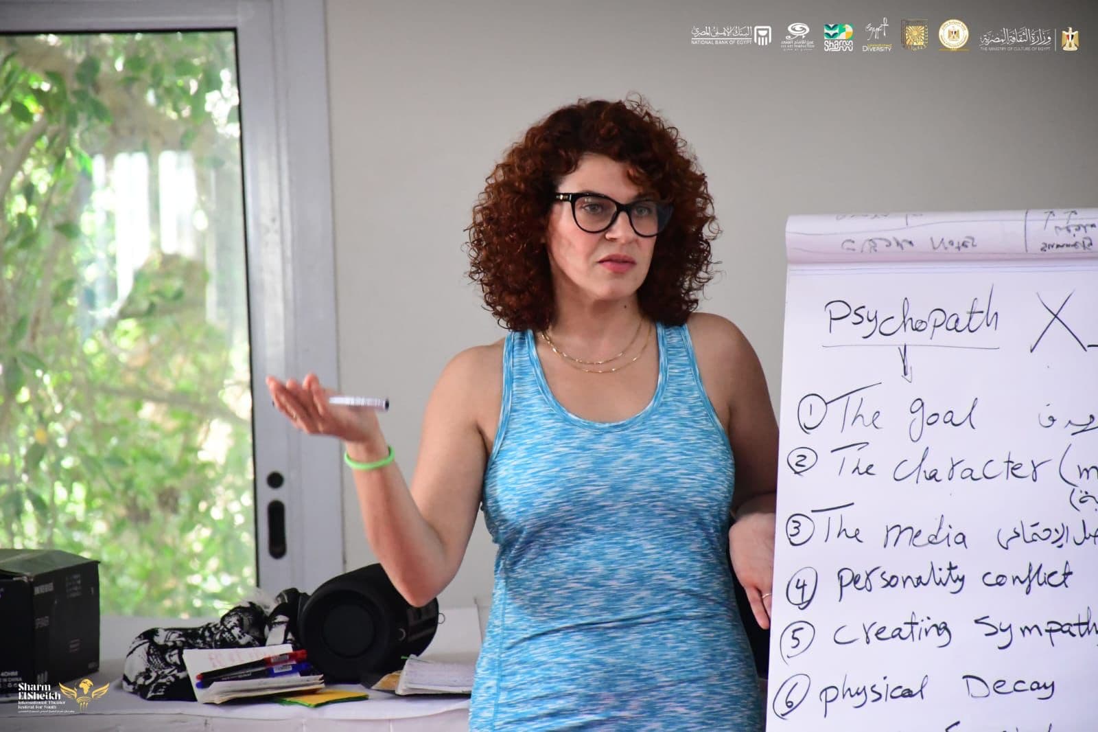 Mona Hala working with a student